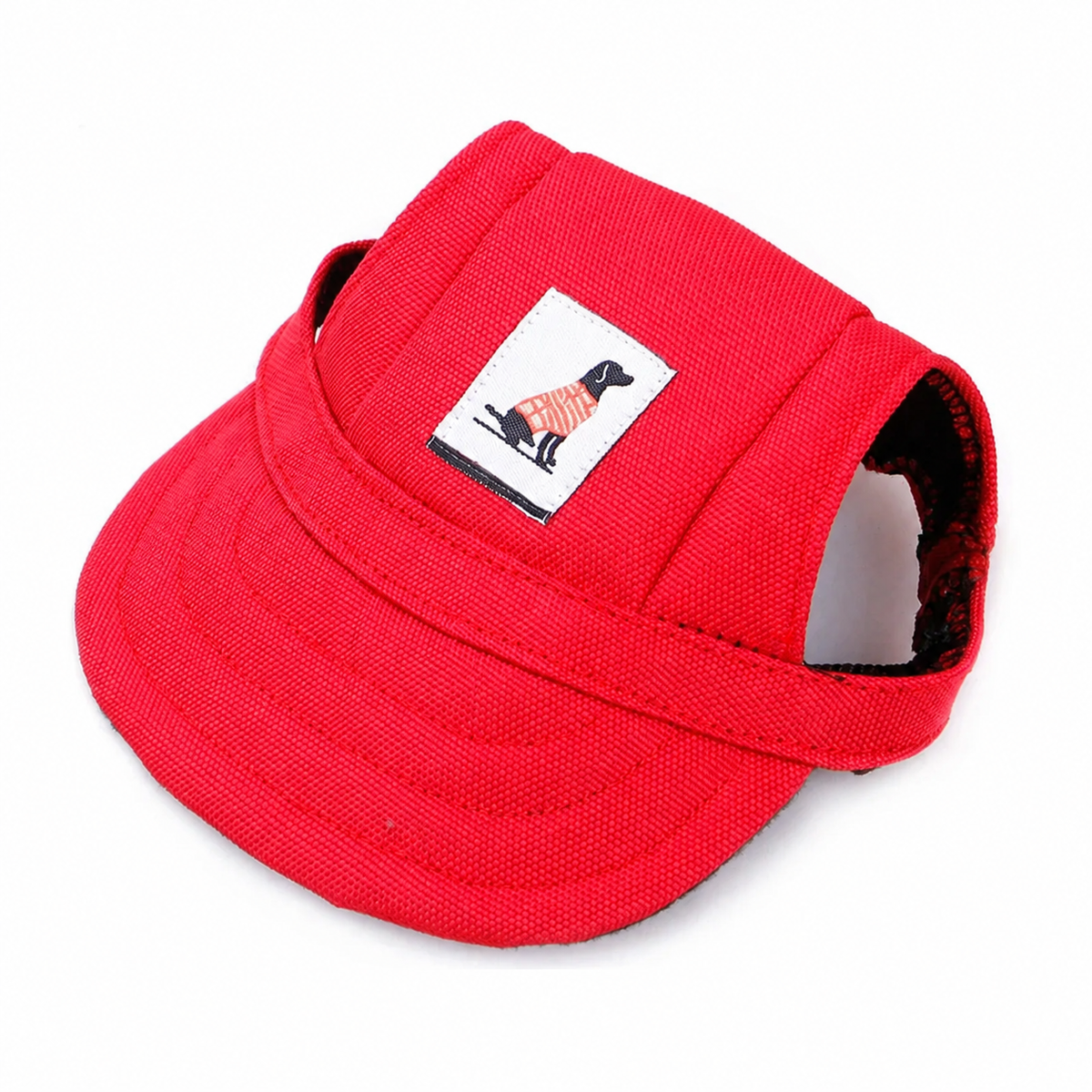 Red pet baseball cap with adjustable strap and sewn dog patch on a clean white background