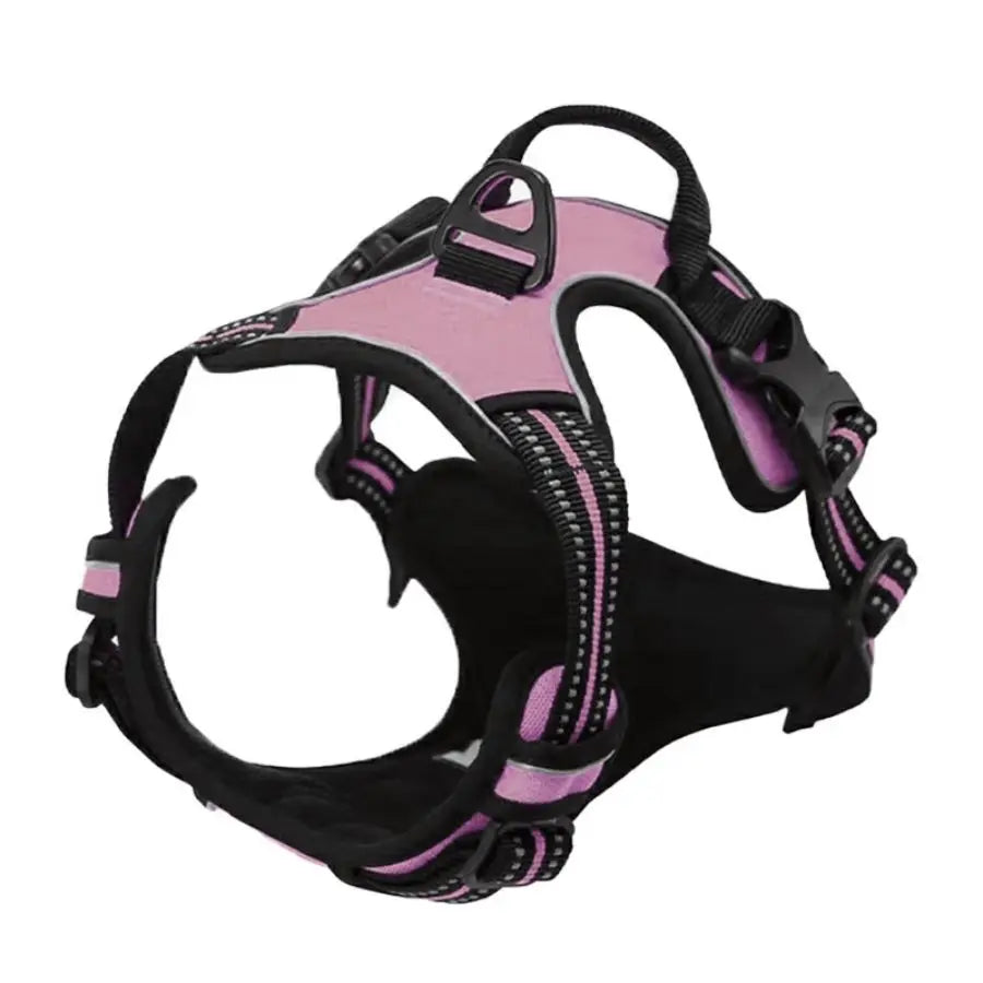 Pink and black dog harness with padded chest panel, reflective stripes, and control handle, side view, for medium to large dogs