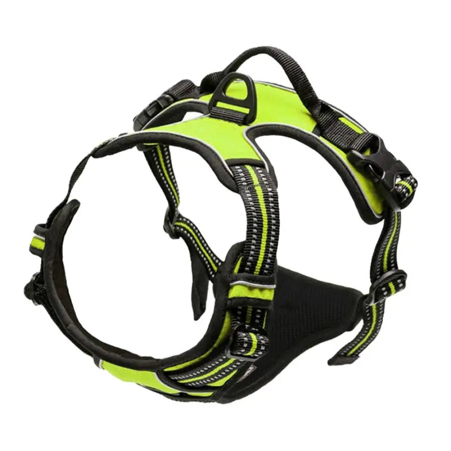 Neon green and black dog harness with reflective stripes, padded chest, control handle, and dual safety buckles, side view