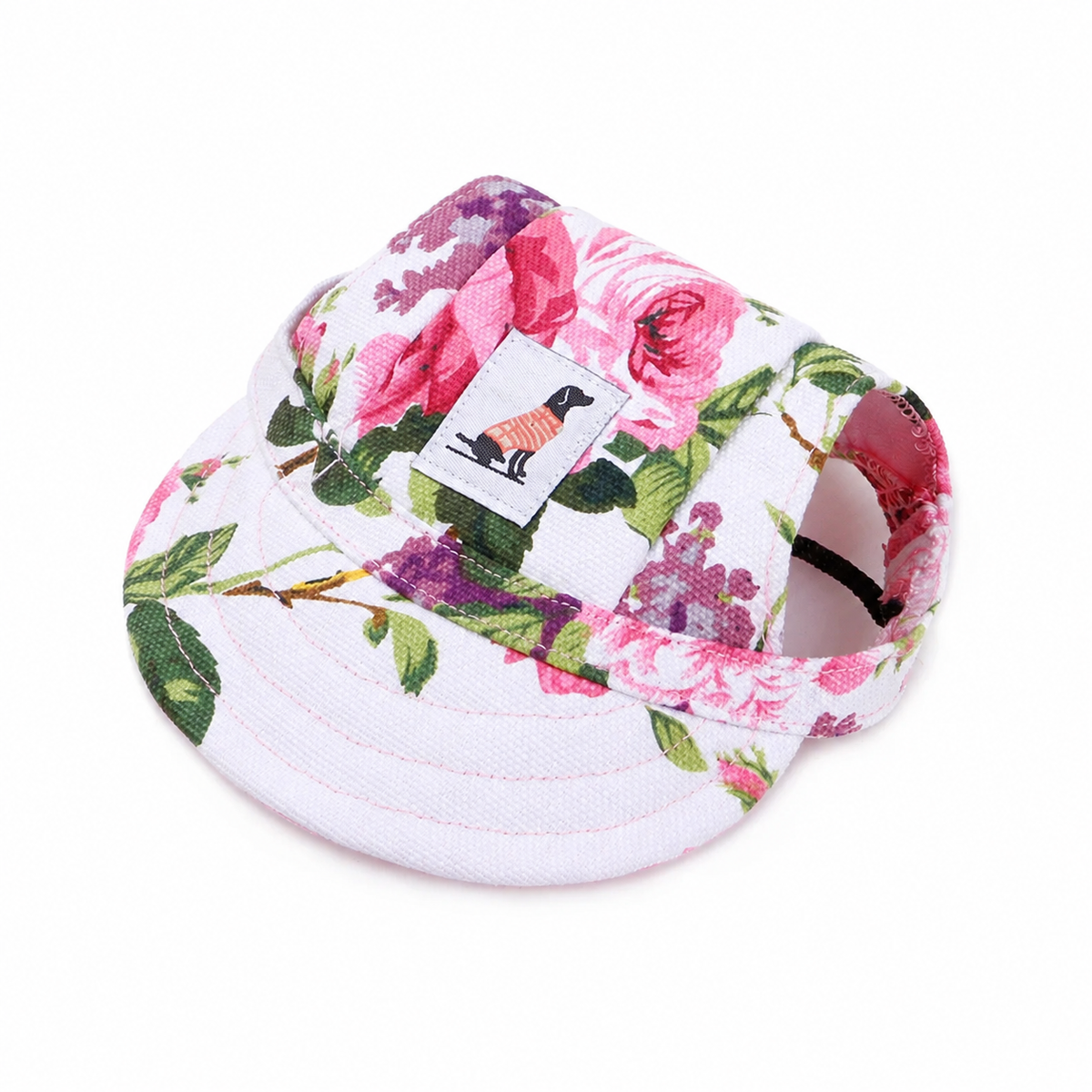 Floral-print pet baseball cap with adjustable strap and sewn dog patch on a clean white background